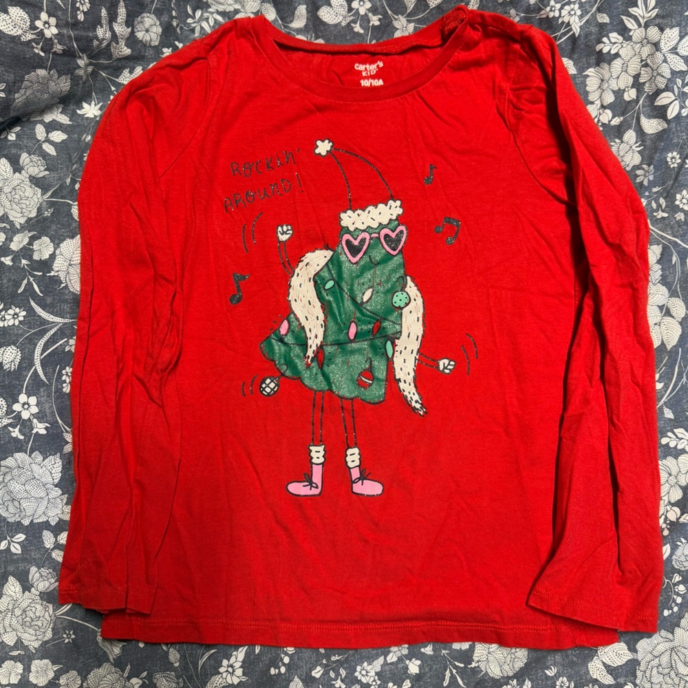 Great condition Carter’s shirt.  Red with mixed colors, size 10